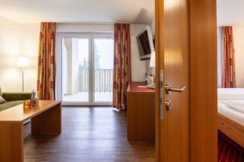 Suite mit Wohnzimmer, Schlafzimmer & Balkon